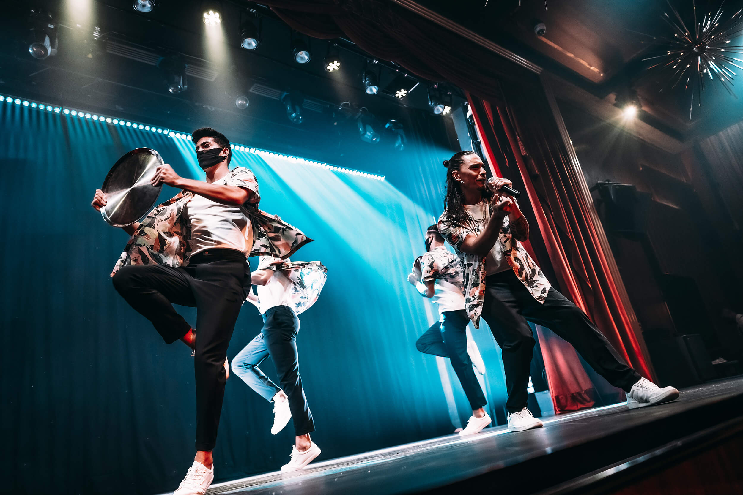 Performers dancing and singing