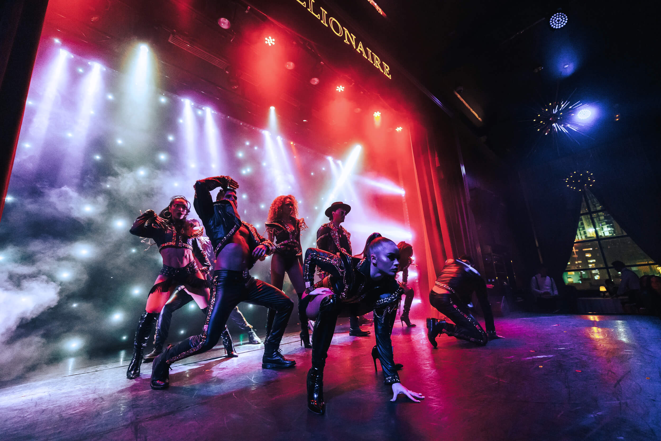 Billionaire performers on stage