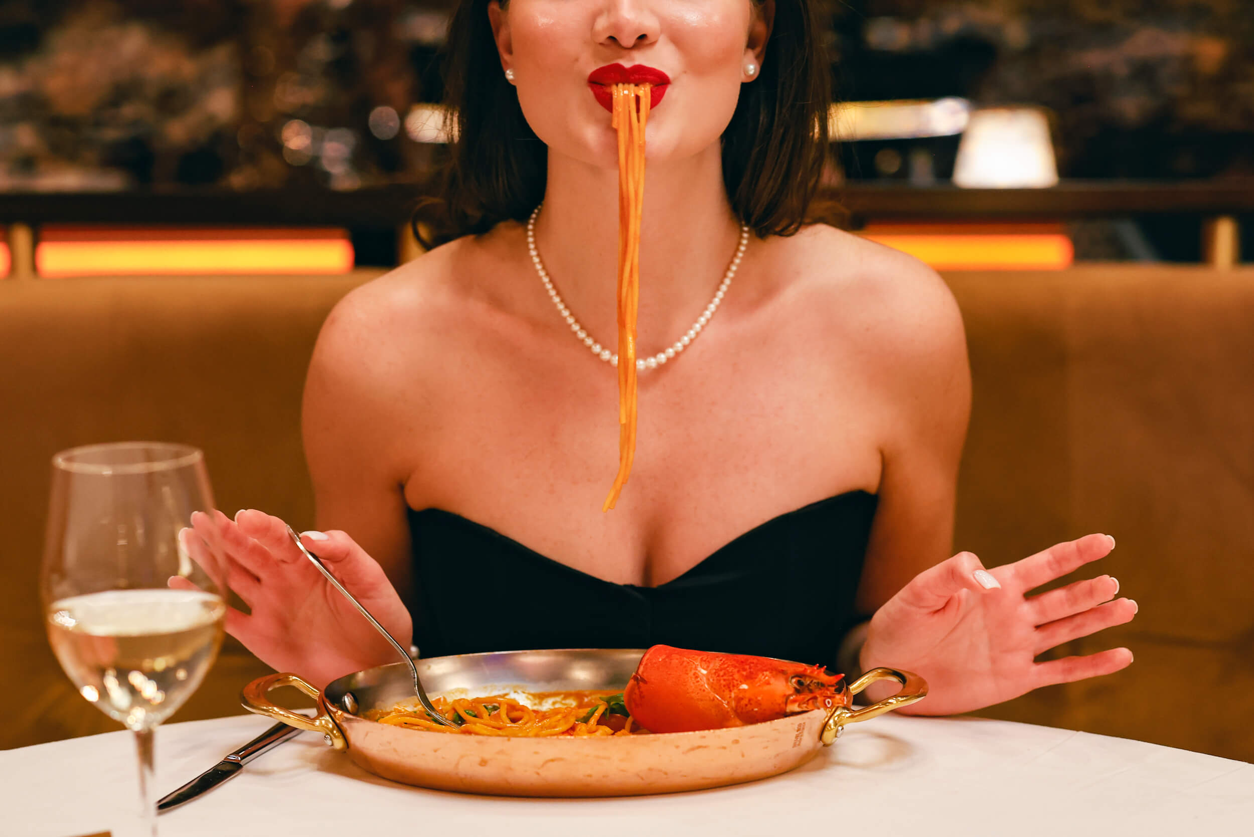 Woman eating spaghetti
