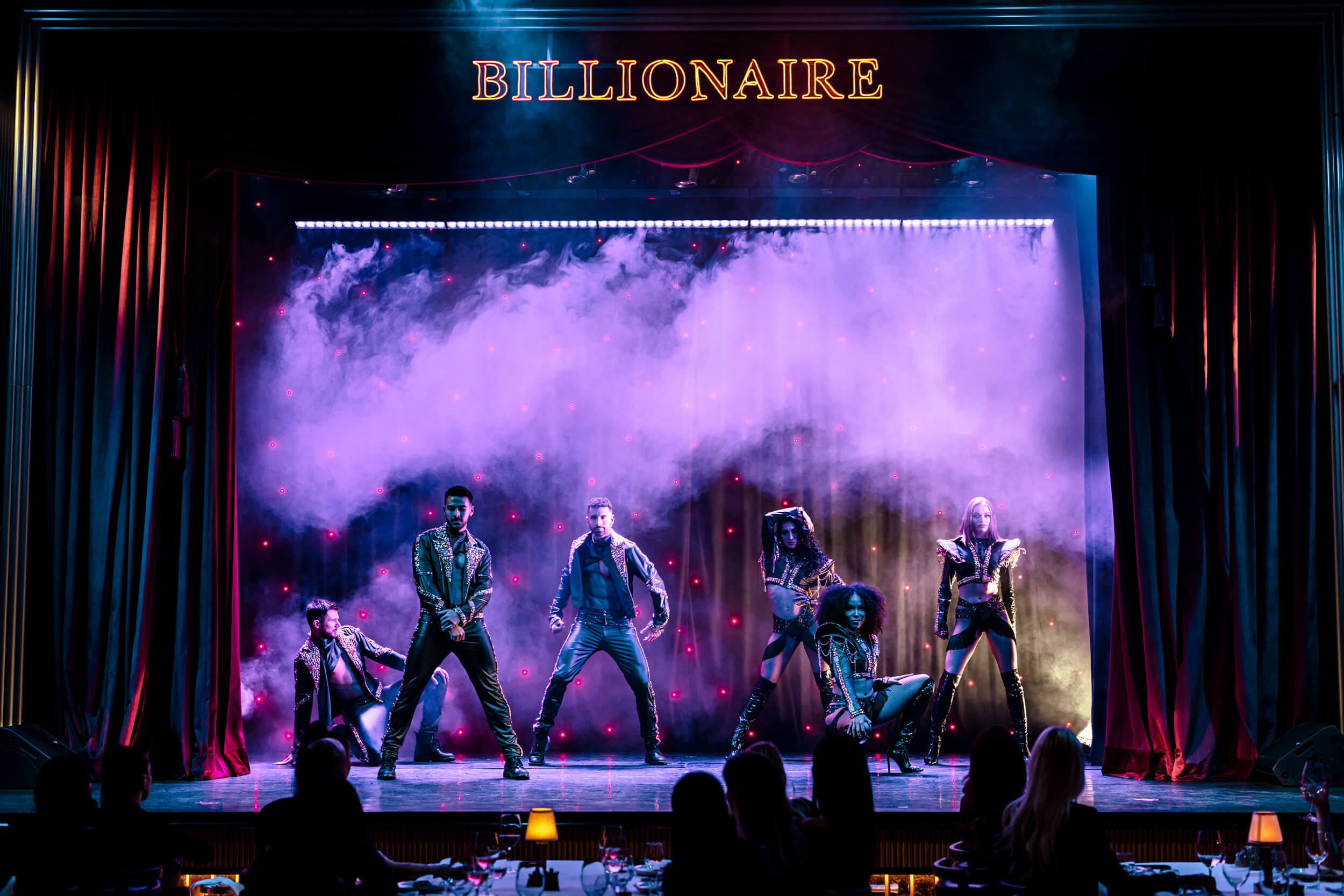 Billionaire performers on stage